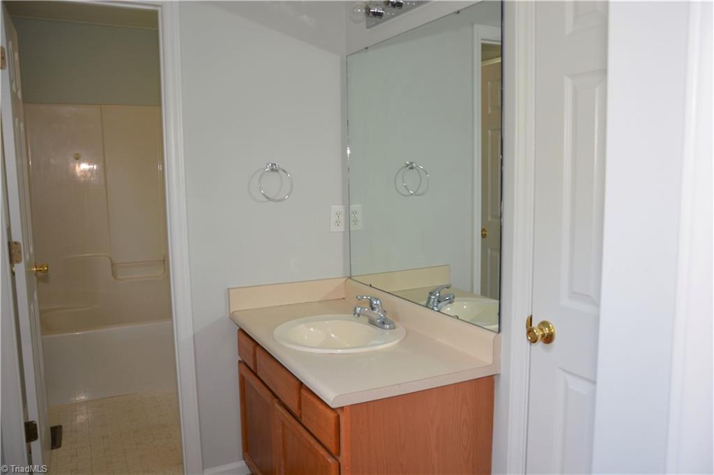2308 Jerico Road Asheboro, NC 27205 - Photo 9 of 11 master bath with dressing area and a large walk in closet