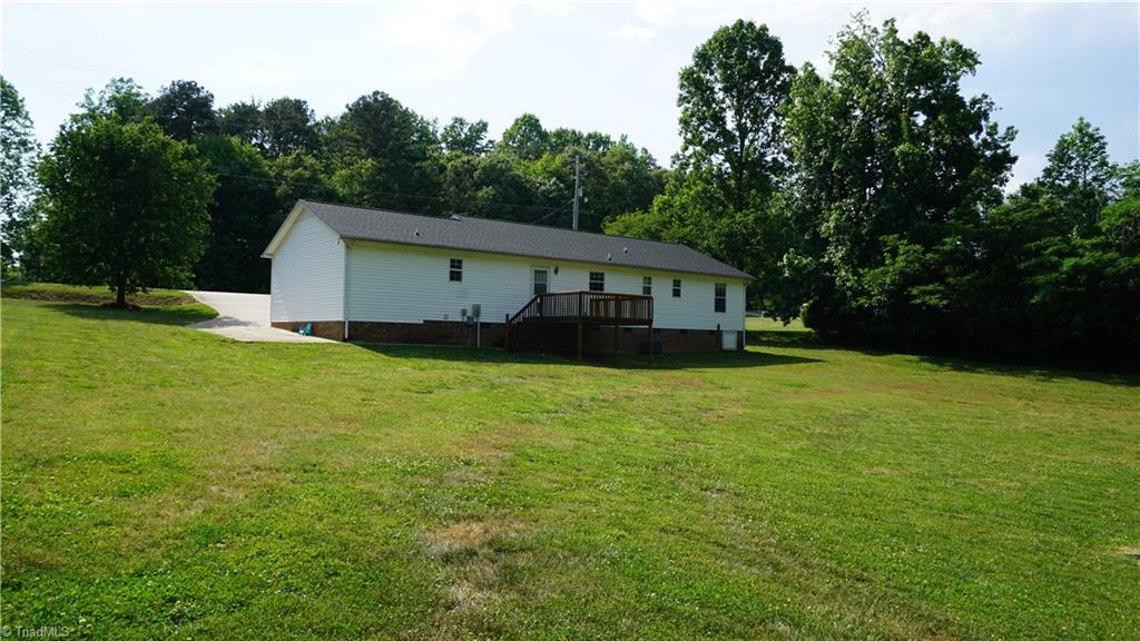 2308 Jerico Road Asheboro, NC 27205 - Photo 10 of 11 back view of house with huge back yard nice deck