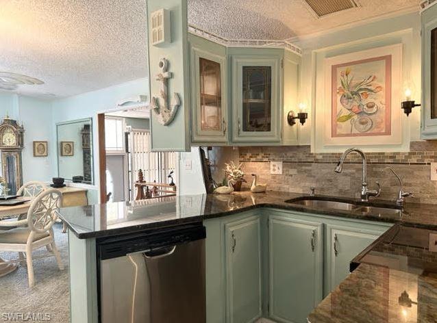 186 Panther Pass Circle, Unit 186 Naples, FL 34114 - Photo 22 of 50 a kitchen with a sink and a refrigerator