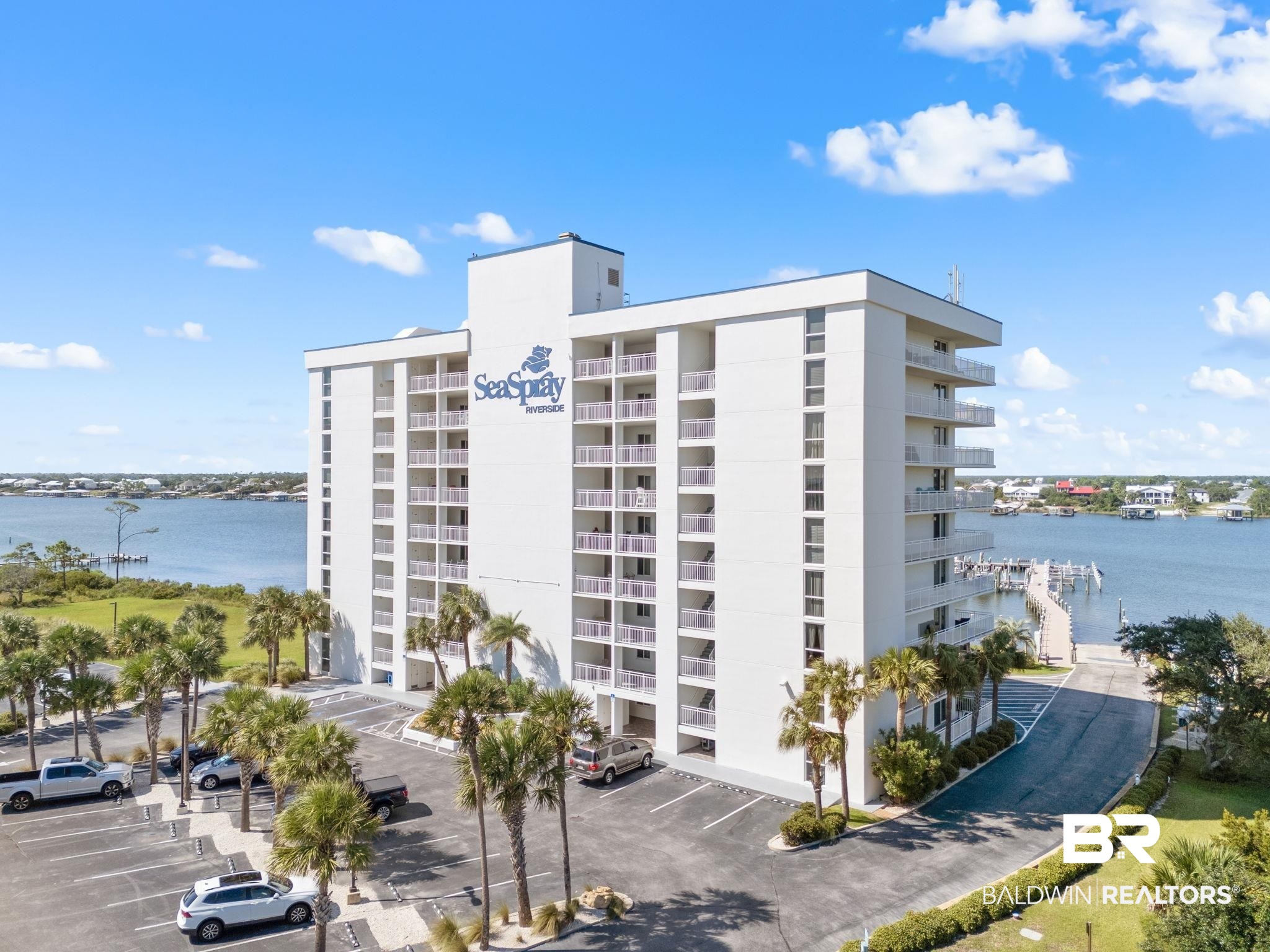 16284 Perdido Key Drive, Unit 912 Perdido Key, FL 32507 - Photo 6 of 49 View of apartment building / complex with a water view and uncovered parking