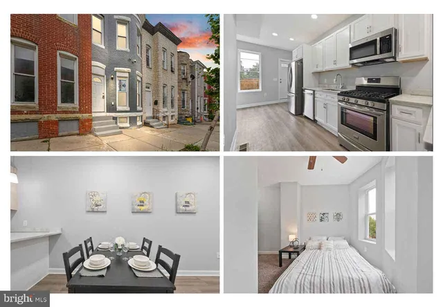 a view of kitchen with stainless steel appliances kitchen island granite countertop a sink and cabinets