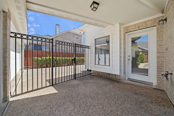 a view of an empty room with a balcony