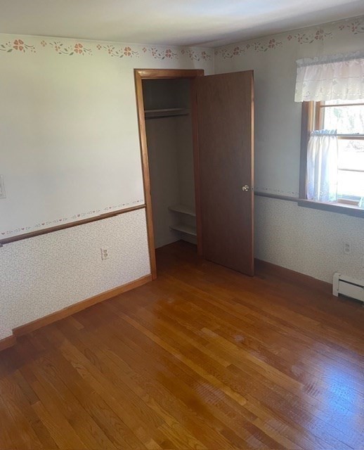 52 Peach Hill Road Berlin, MA 01503 - Photo 20 of 27 a view of empty room with window and wooden floor