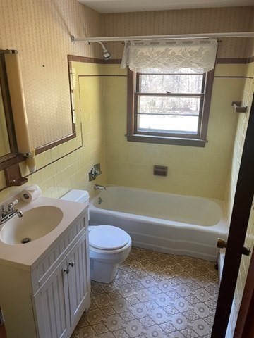 52 Peach Hill Road Berlin, MA 01503 - Photo 23 of 27 a bathroom with a sink and a bathtub