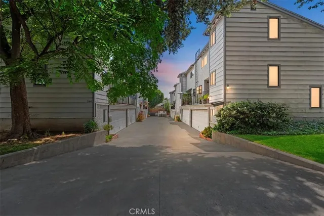 a view of a street with houses