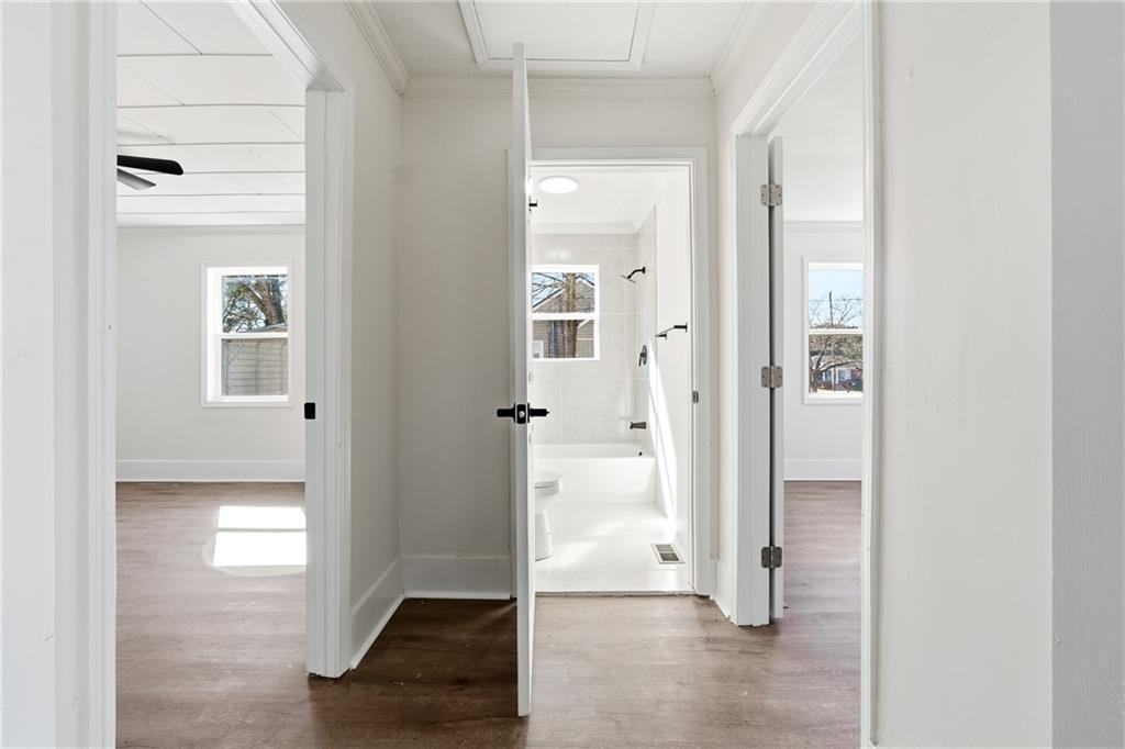 34 Wade Street Winder, GA 30680 - Photo 15 of 22 a view of a bathroom with a glass door