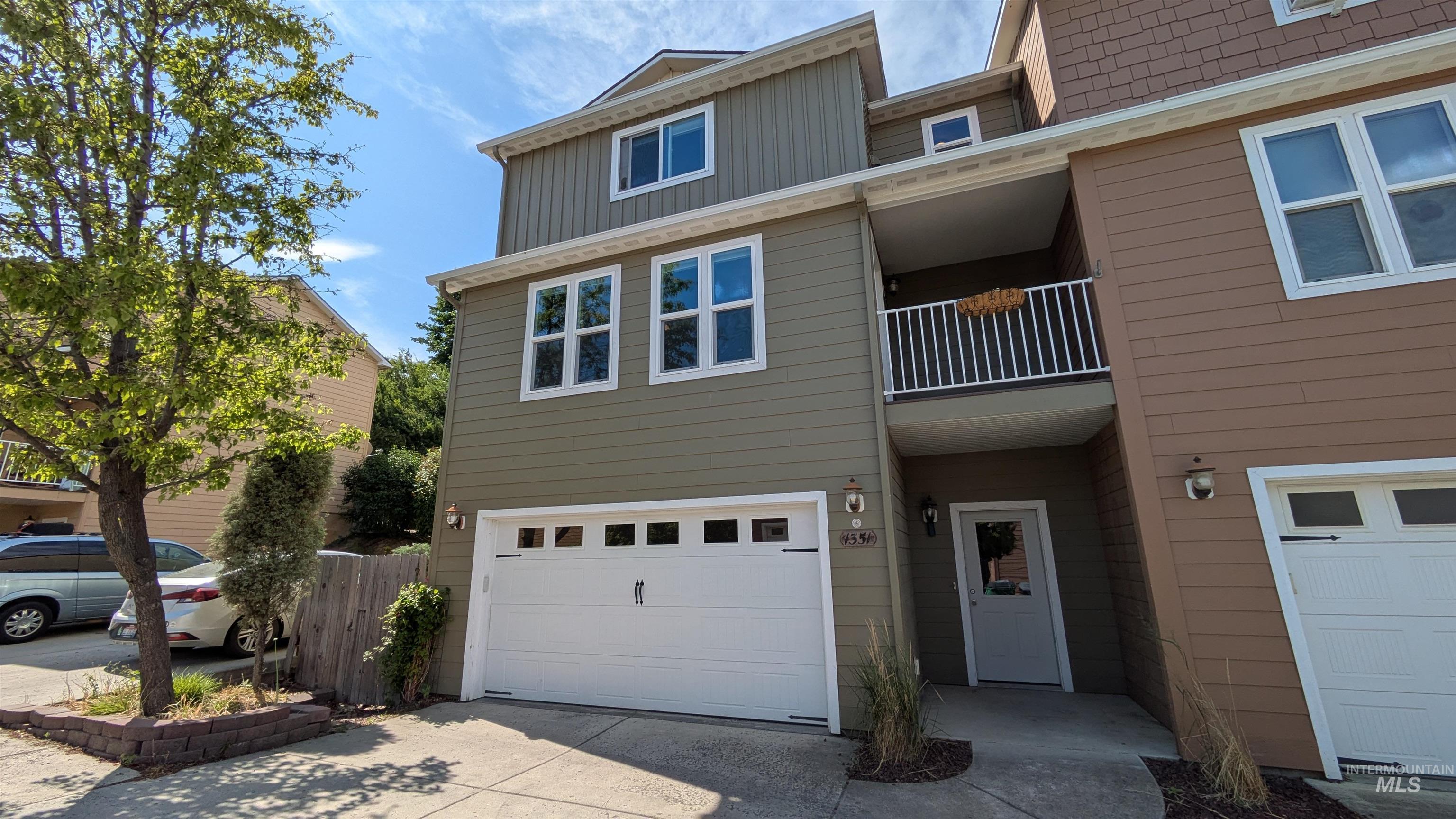 1351 Bristol Road Moscow, ID 83843 - Photo 1 of 1 View of property with an attached garage, a balcony, and driveway
