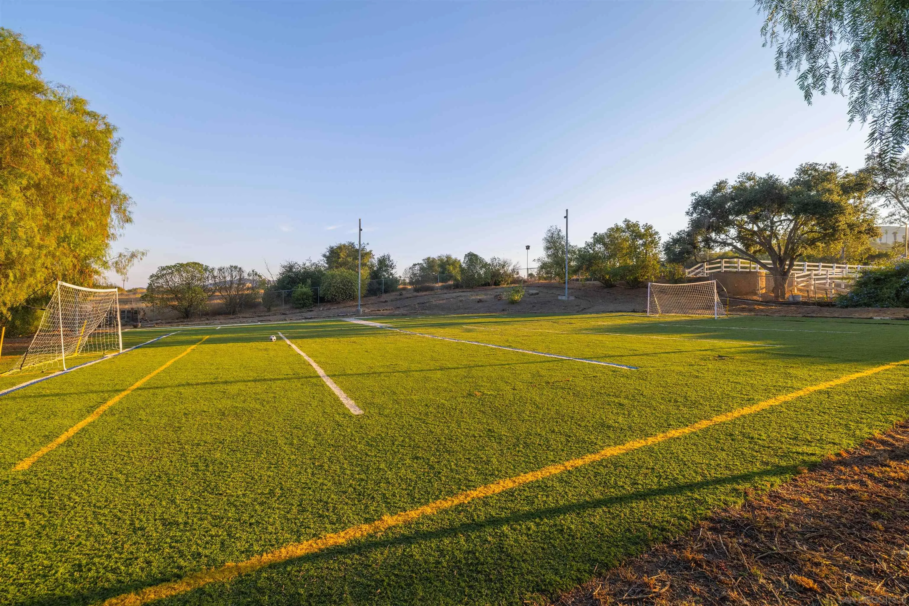 1454 Romance Road Escondido, CA 92029 - Photo 19 of 28 a view of an outdoor space and tennis court