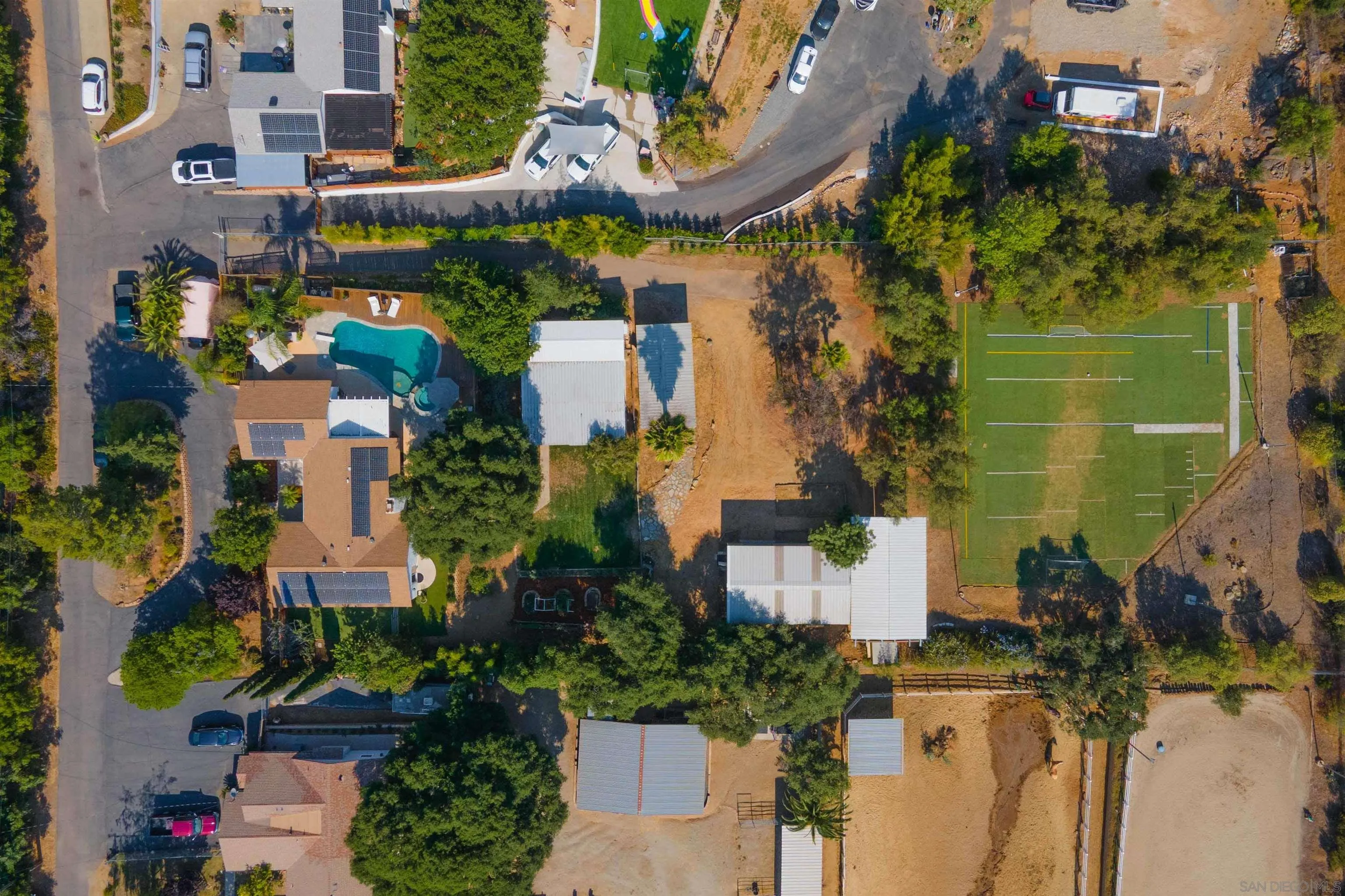 1454 Romance Road Escondido, CA 92029 - Photo 27 of 28 an aerial view of multiple houses with yard