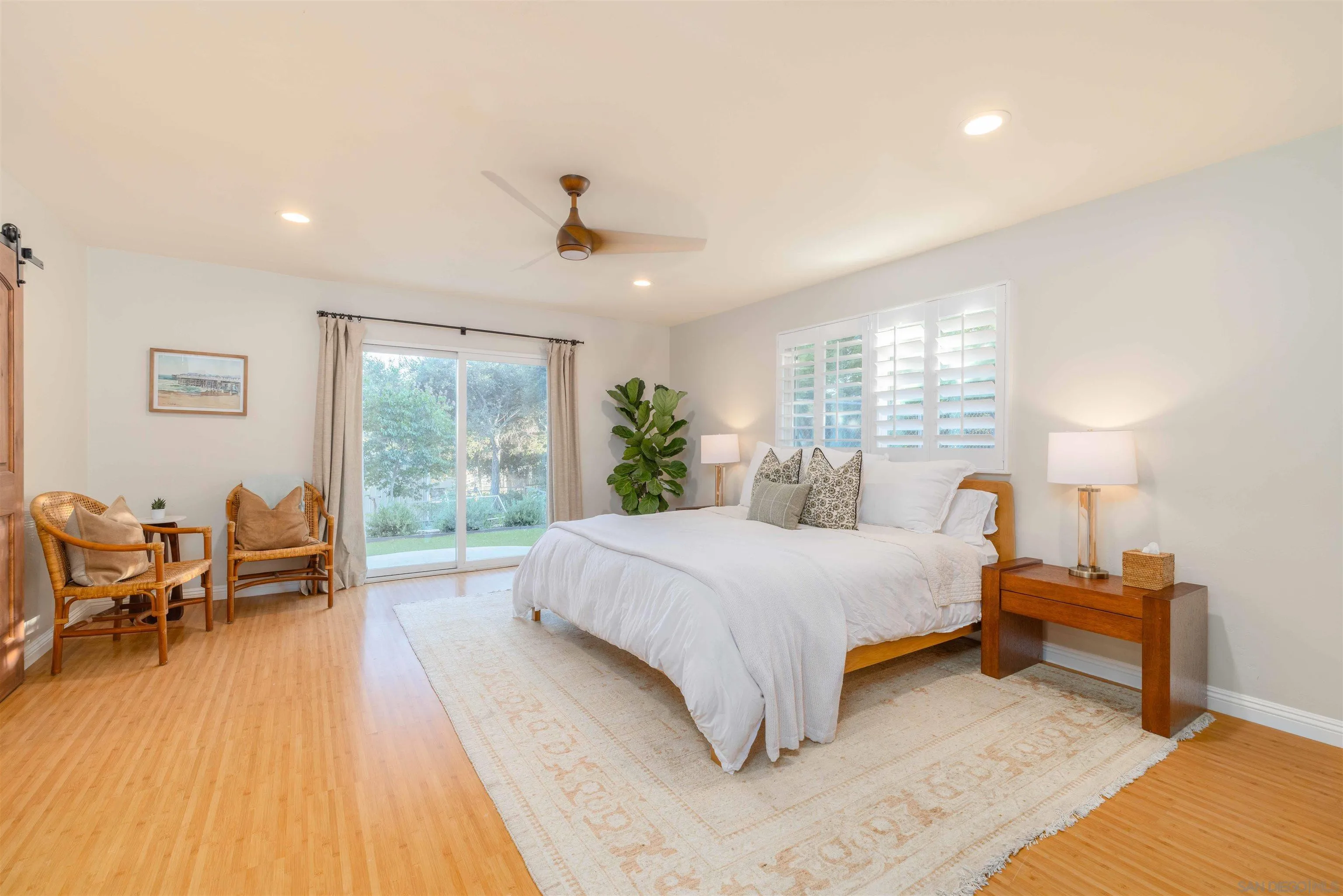 1454 Romance Road Escondido, CA 92029 - Photo 6 of 28 a spacious bedroom with a bed and a table