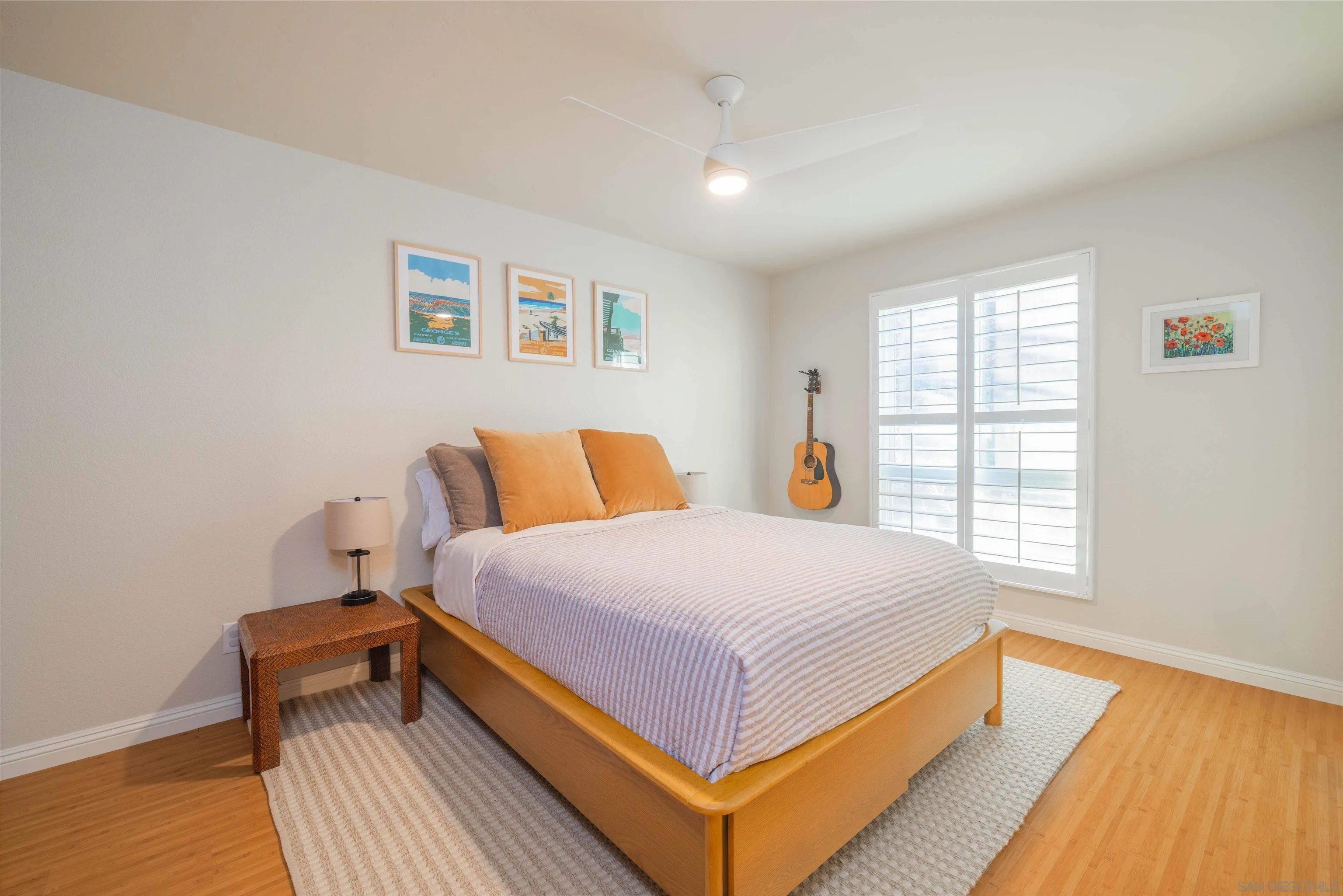 1454 Romance Road Escondido, CA 92029 - Photo 7 of 28 a bedroom with a bed and wooden floor