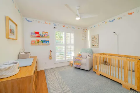 a bed room with furniture and a window