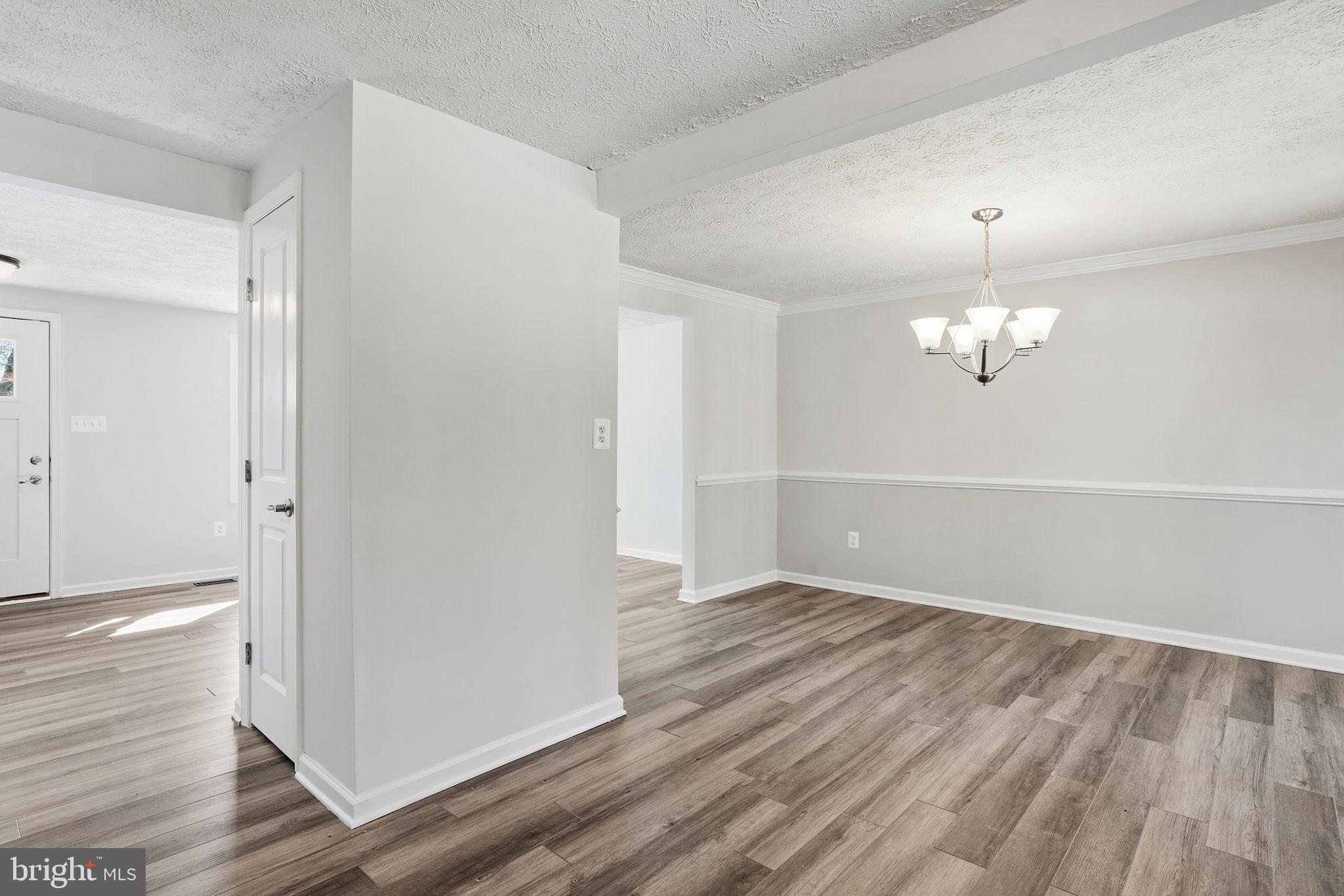 474 Ruffian Court Annapolis, MD 21409 - Photo 36 of 36 wooden floor in an empty room with a window