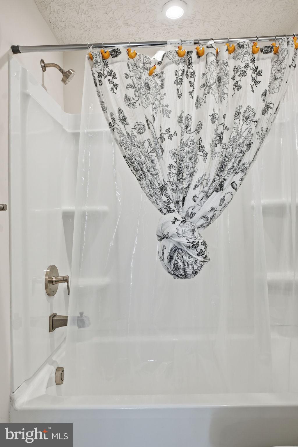 474 Ruffian Court Annapolis, MD 21409 - Photo 15 of 36 a bathroom with a bathtub and shower