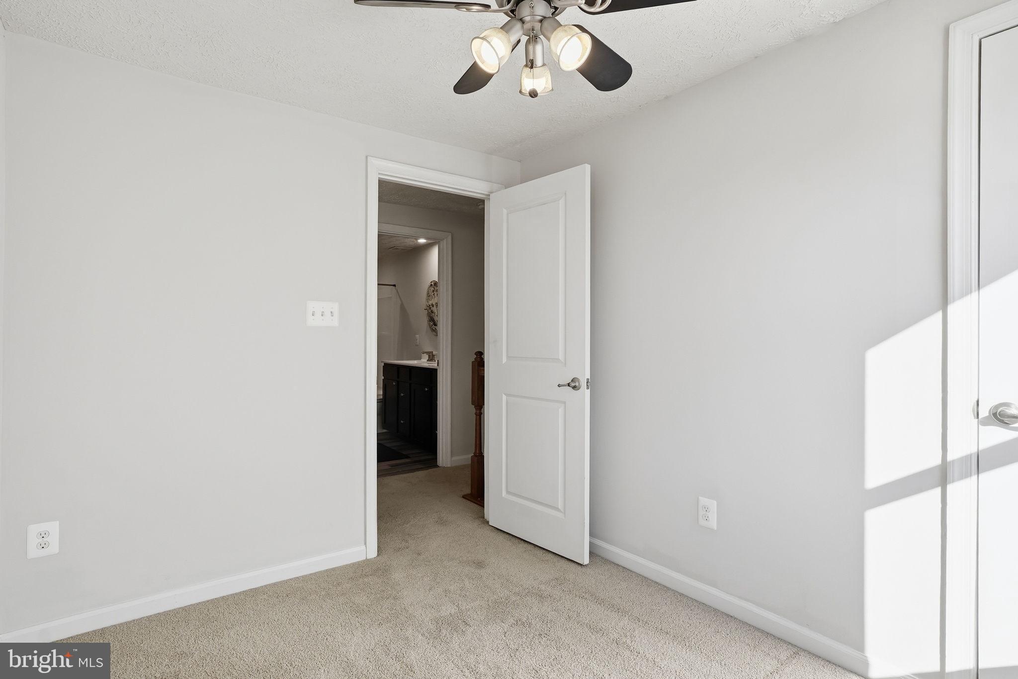 474 Ruffian Court Annapolis, MD 21409 - Photo 17 of 36 a view of a livingroom with a chandelier fan