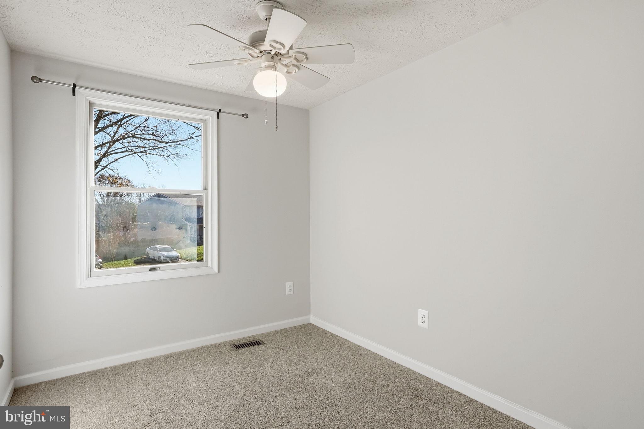 474 Ruffian Court Annapolis, MD 21409 - Photo 18 of 36 an empty room with a window