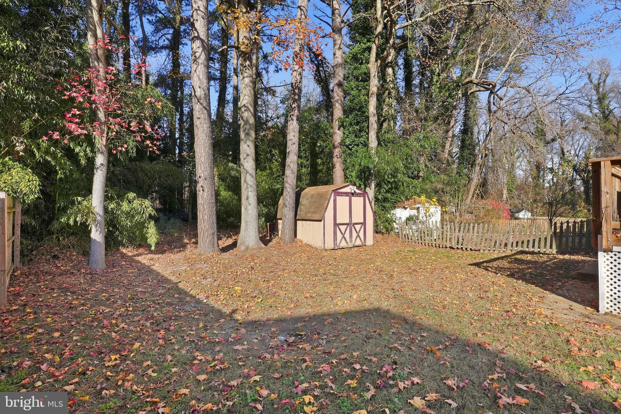 474 Ruffian Court Annapolis, MD 21409 - Photo 31 of 36 a backyard of a house with table and chairs