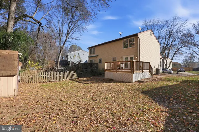 a view of a backyard of the house