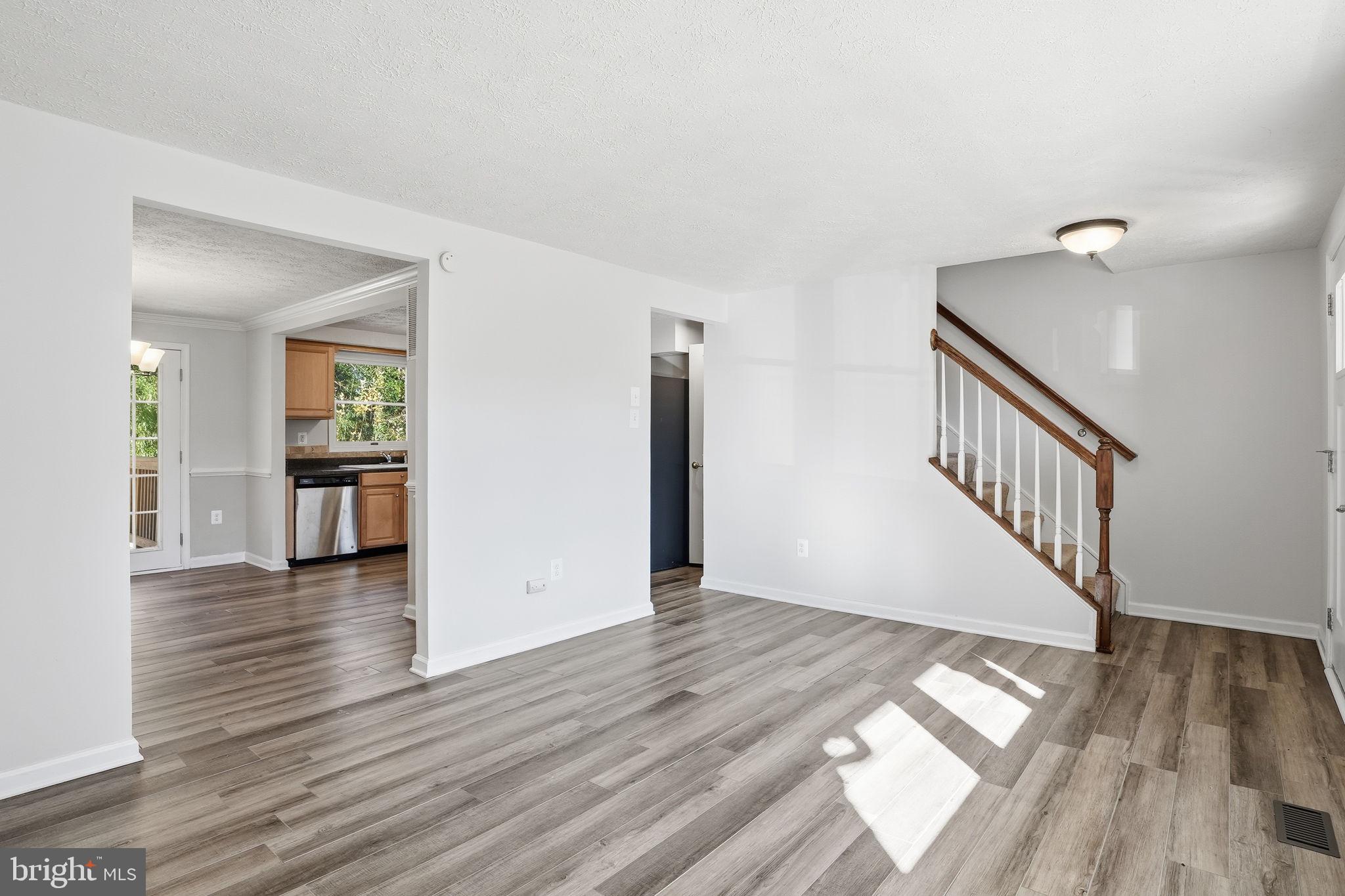 474 Ruffian Court Annapolis, MD 21409 - Photo 5 of 36 a view of interior space with wooden floor and stairs