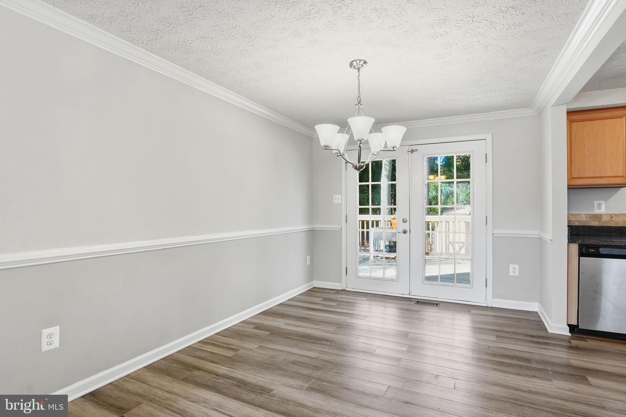474 Ruffian Court Annapolis, MD 21409 - Photo 10 of 36 a view of a livingroom with wooden floor