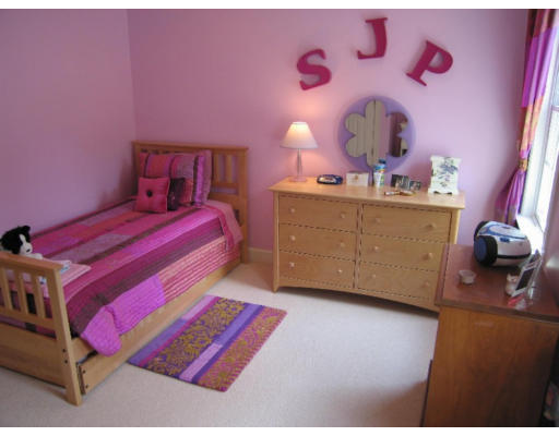 41 Woodcliffe Road Lexington, MA 02421 - Photo 17 of 26 a bedroom with a bed and a dresser