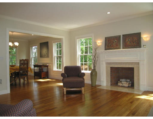 41 Woodcliffe Road Lexington, MA 02421 - Photo 8 of 26 a living room with furniture and a fireplace