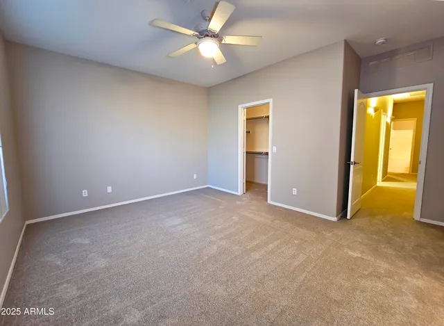 a view of an empty walk in closet