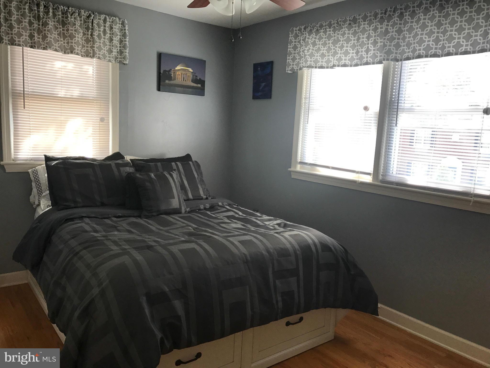 204 West Glebe Road Alexandria, VA 22305 - Photo 16 of 26 a bedroom with a bed and window