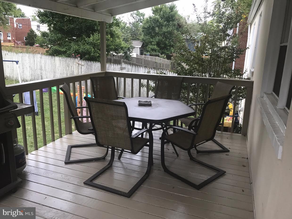 204 West Glebe Road Alexandria, VA 22305 - Photo 21 of 26 a view of balcony with furniture and wooden deck