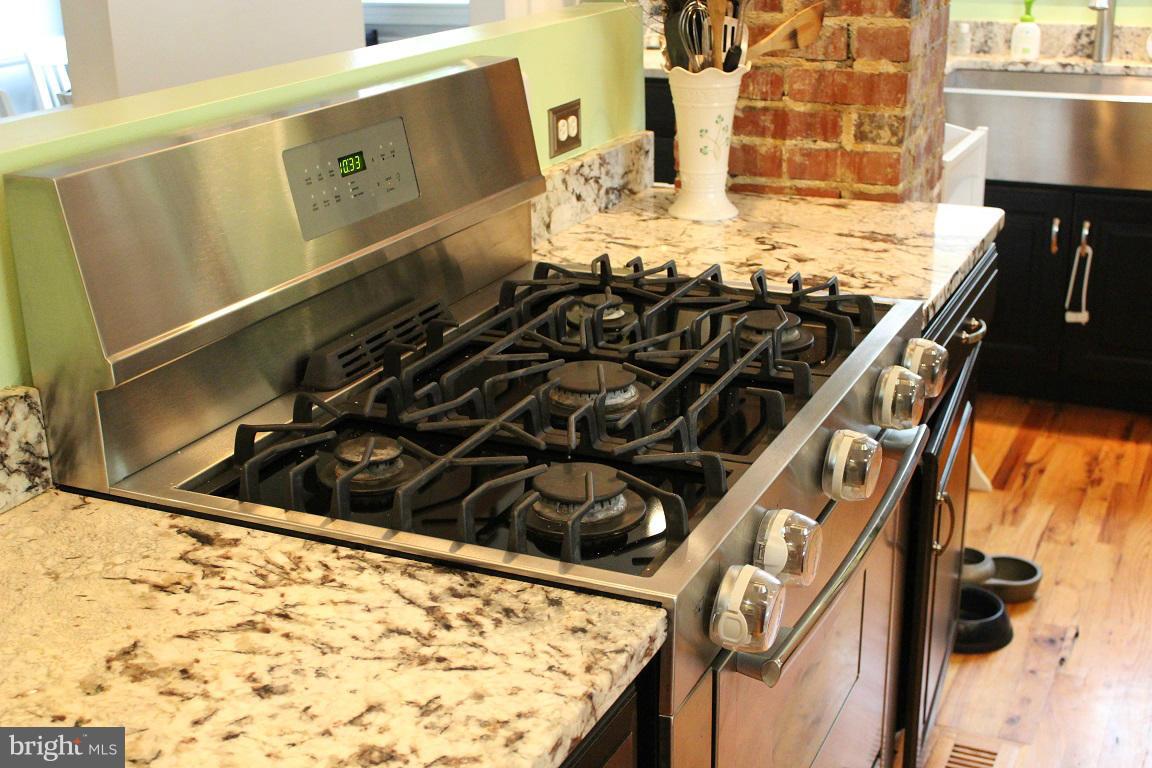 204 West Glebe Road Alexandria, VA 22305 - Photo 5 of 26 a close view of a sink and a stove