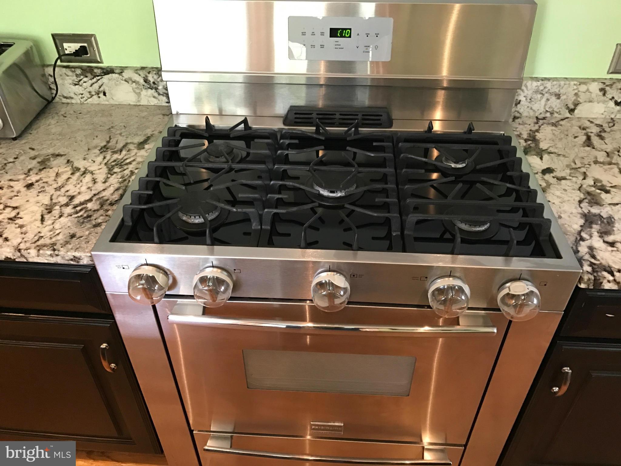 204 West Glebe Road Alexandria, VA 22305 - Photo 6 of 26 a close view of sink a stove and oven