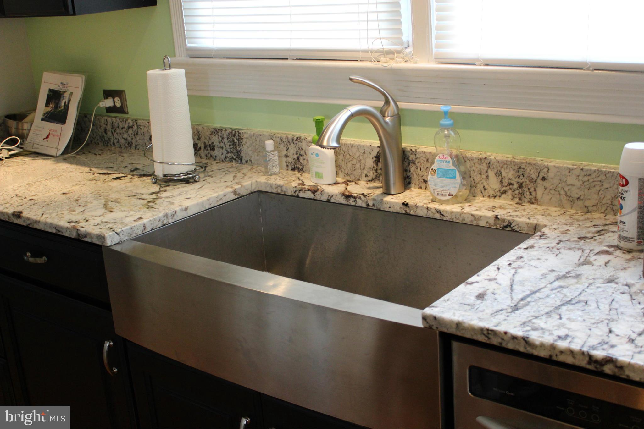 204 West Glebe Road Alexandria, VA 22305 - Photo 7 of 26 a close view of sink and tap