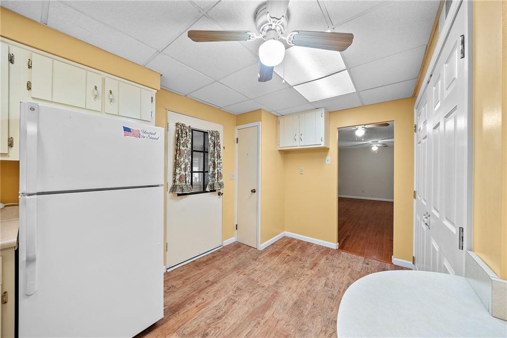 185 Walnut Street Beaver, PA 15009 - Photo 14 of 43 a white refrigerator freezer sitting in a kitchen