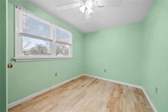 a view of a room that has a window in it