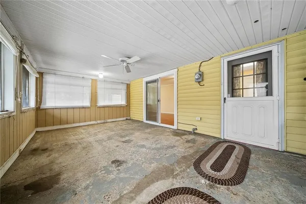 a view of an empty room and window