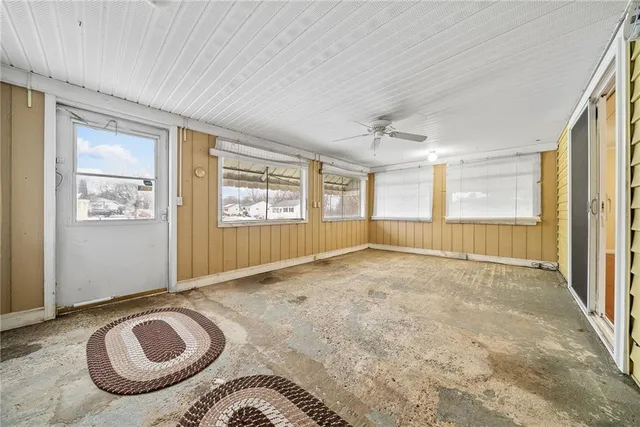 a view of empty room with front door