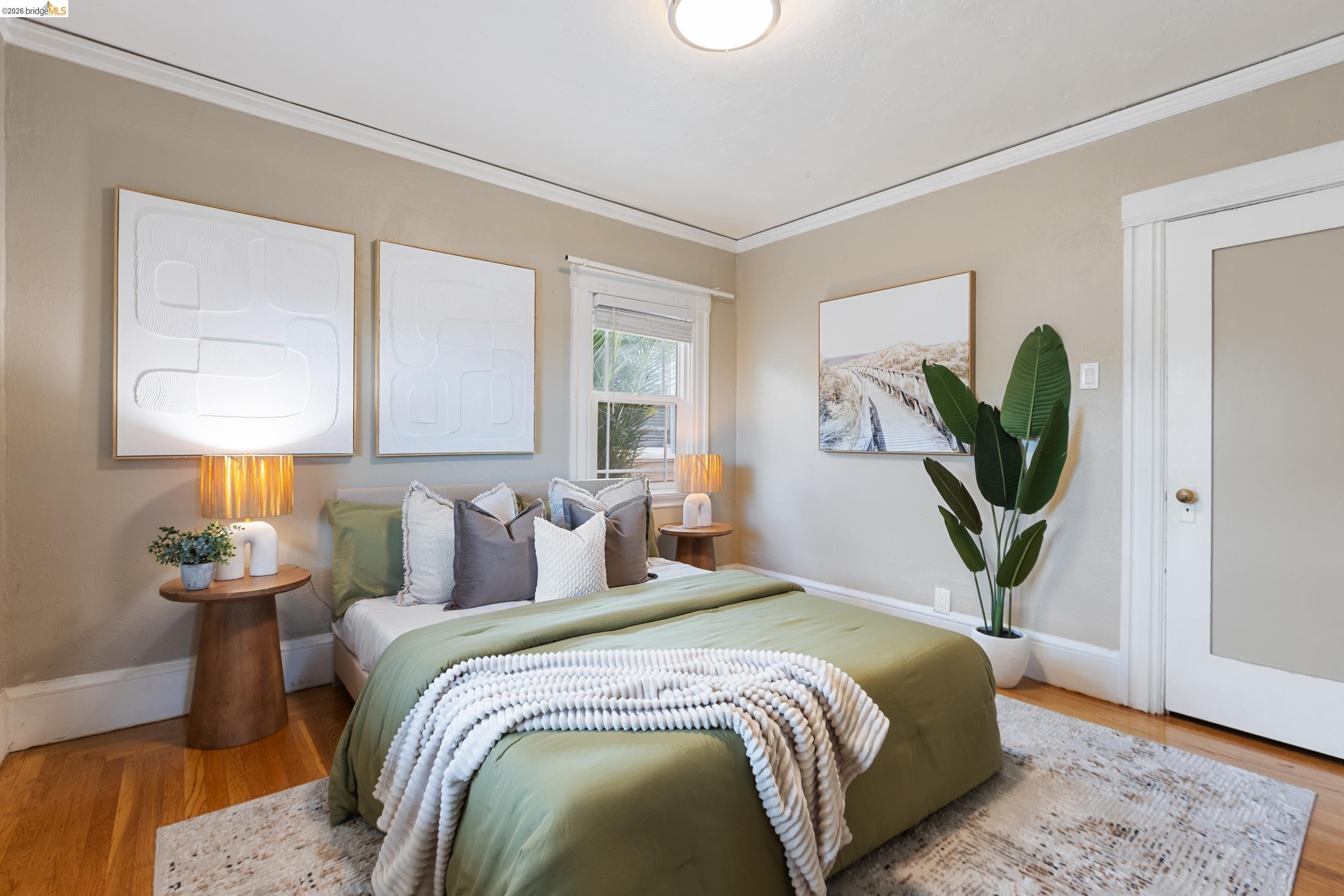 2316 Ransom Avenue Oakland, CA 94601 - Photo 26 of 37 a bedroom with a bed and a lamp