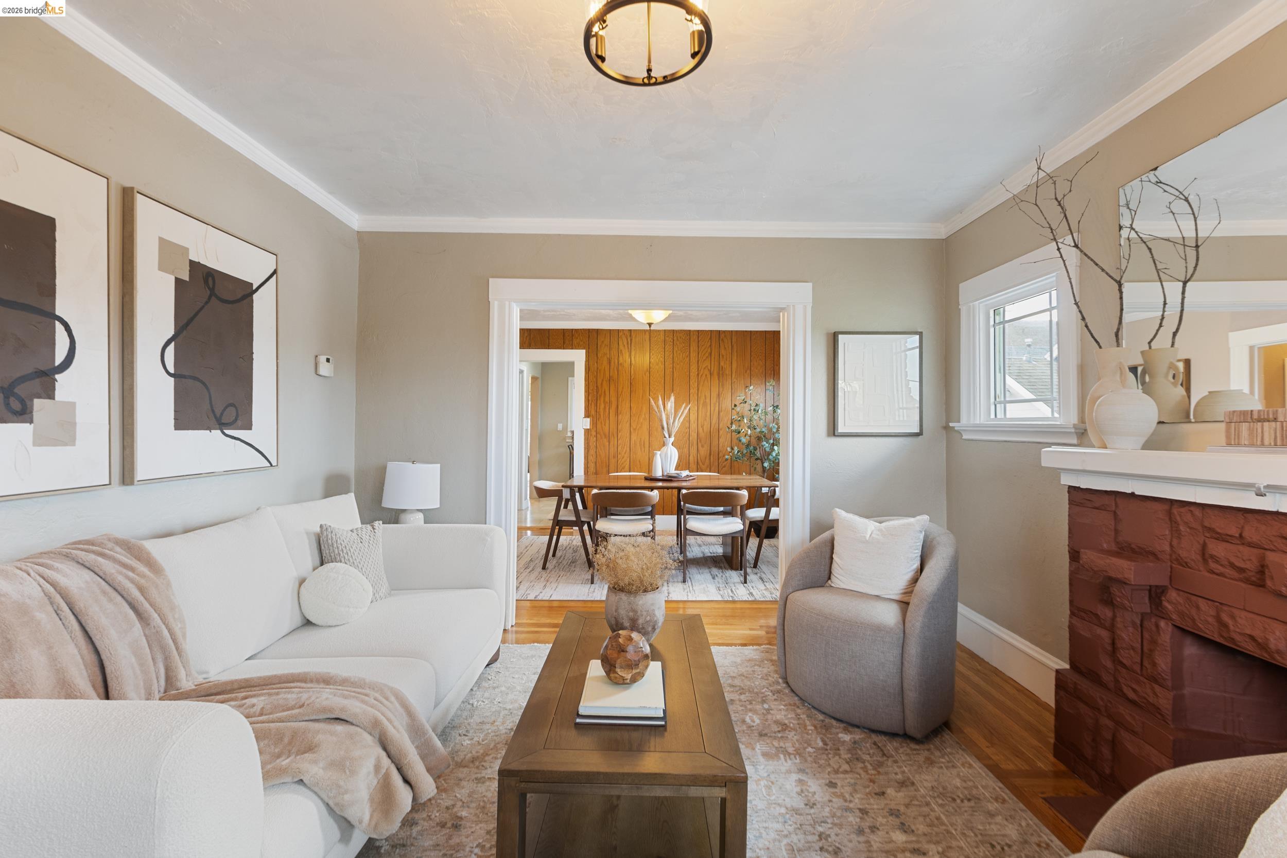 2316 Ransom Avenue Oakland, CA 94601 - Photo 6 of 37 a living room with furniture and a large window