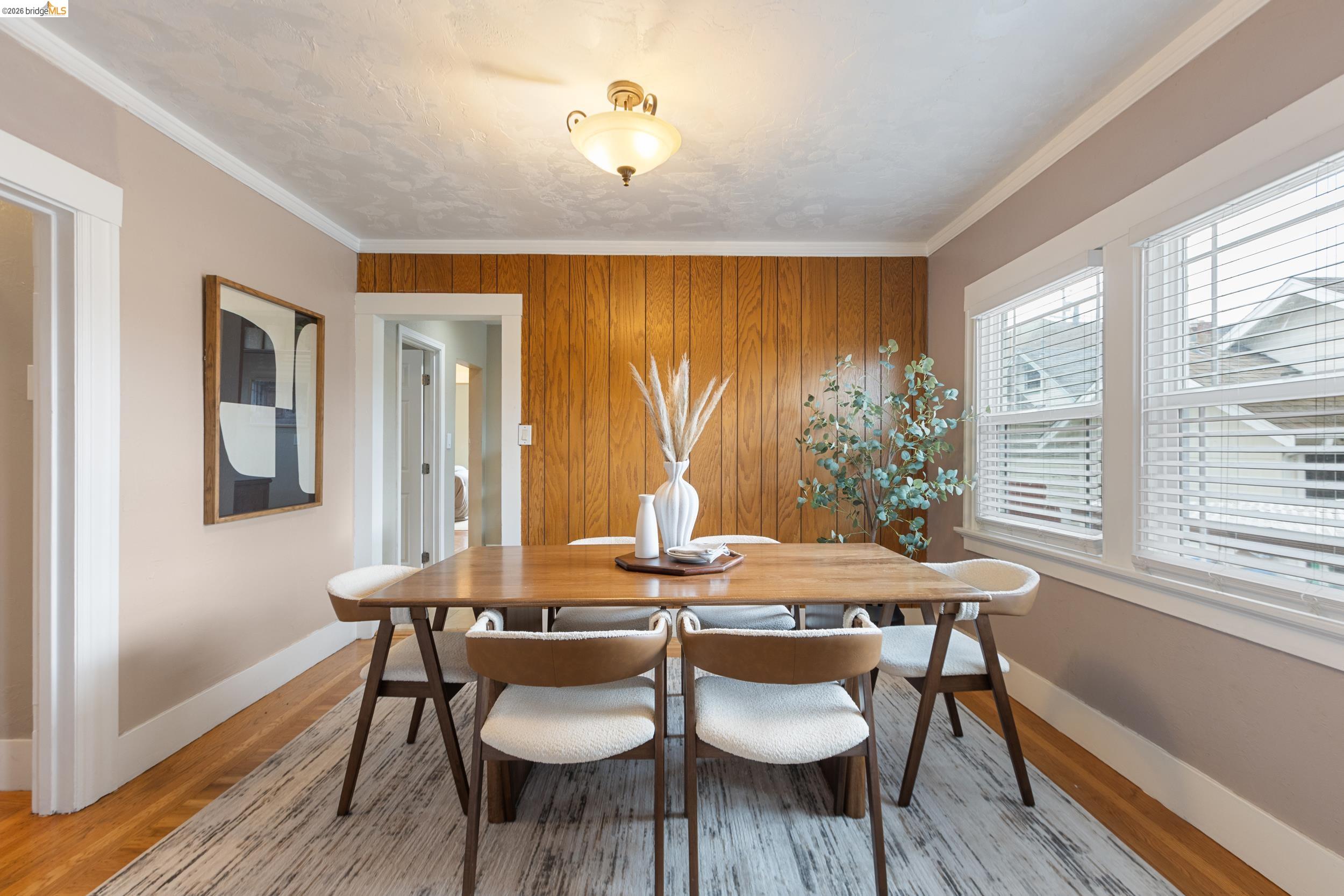 2316 Ransom Avenue Oakland, CA 94601 - Photo 10 of 37 a view of a dining room with furniture window and wooden floor