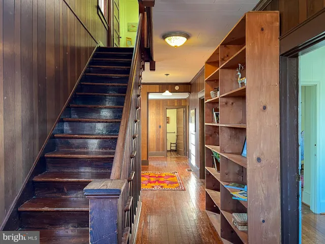 a living room with furniture rug and window