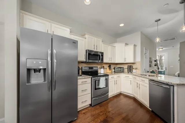a bathroom with a sink a mirror and a toilet
