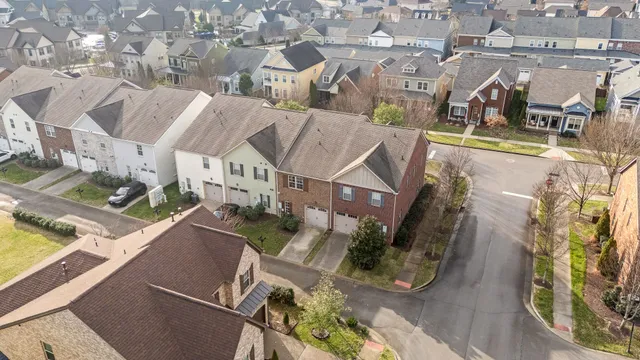 a view of a white building among the street