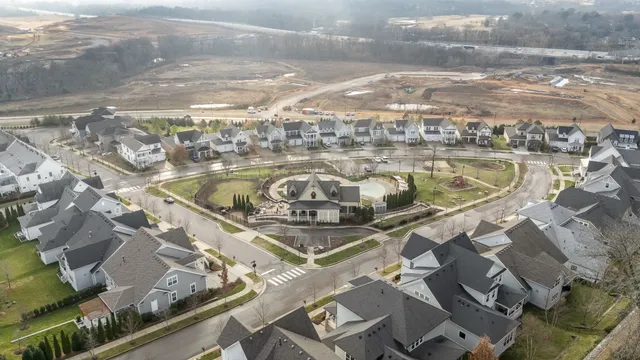 a view of swimming pool with a lounge chairs