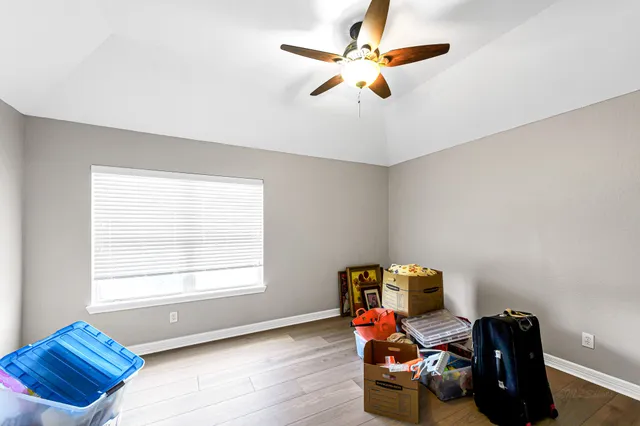 a workspace with furniture and a window
