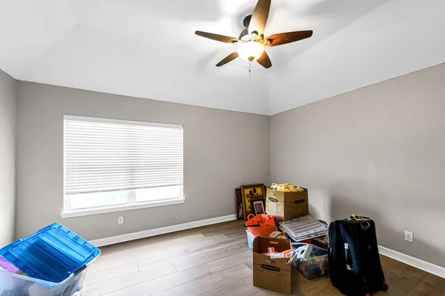 a workspace with furniture and a window