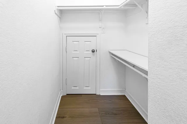 a view of a porch with a garden