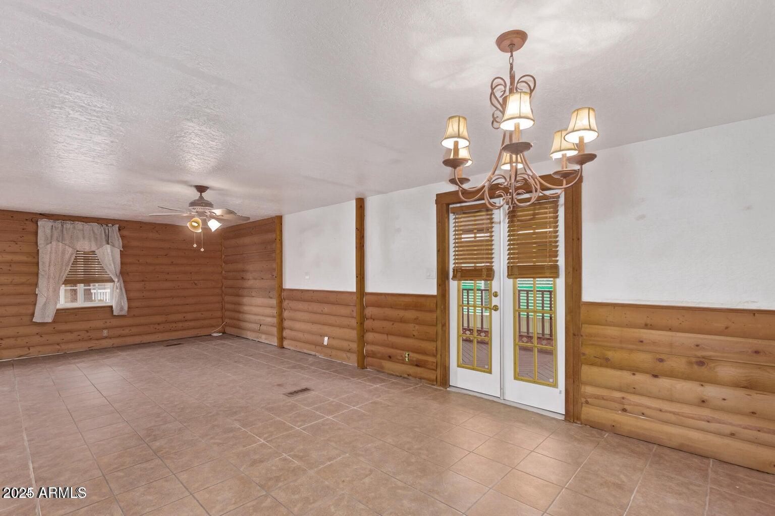 201 South Greenfield Road, Unit 331 Mesa, AZ 85206 - Photo 12 of 49 an empty room with windows
