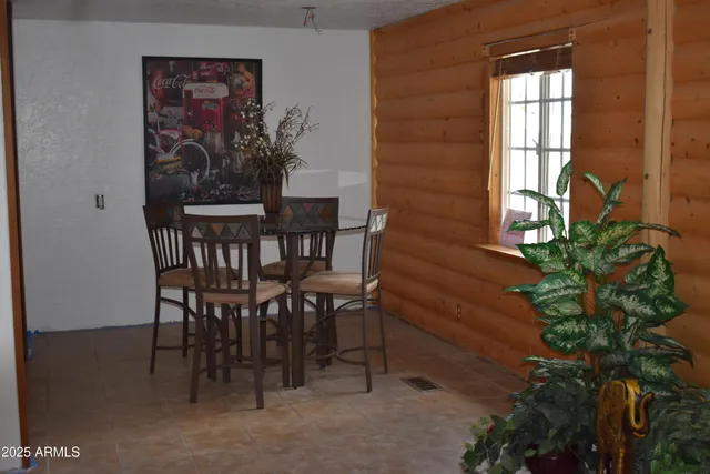 a bench sitting in patio of a house