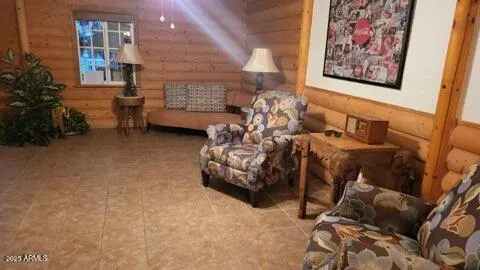 a view of kitchen cabinetry and a refrigerator