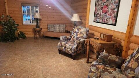 201 South Greenfield Road, Unit 331 Mesa, AZ 85206 - Photo 19 of 49 a bedroom with furniture and a couch